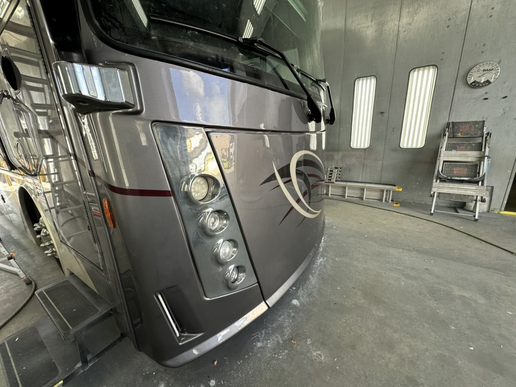Finished motorhome front cap viewed from the entry-door side