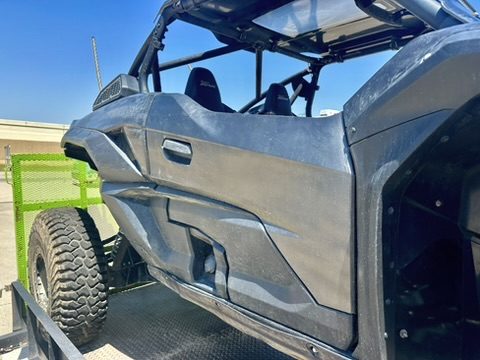Teryx KRX door panel before service, dull and scratched