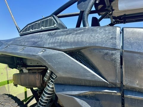 Scratched rear fender of the UTV before service