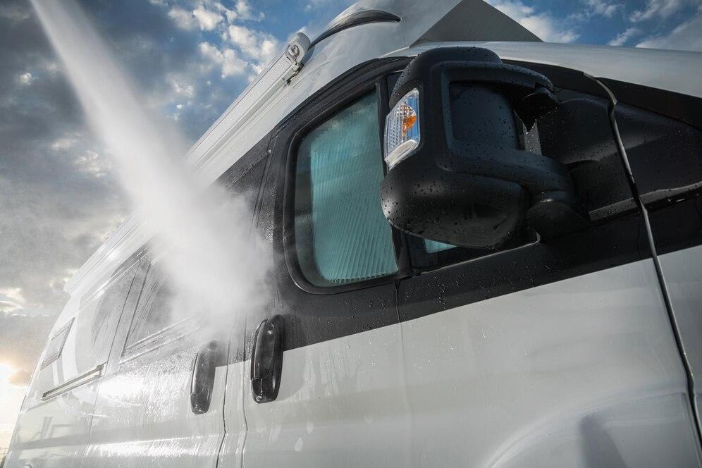 pressure-washing-rv-camper-van-before-summer-season_1426-7740-transformed