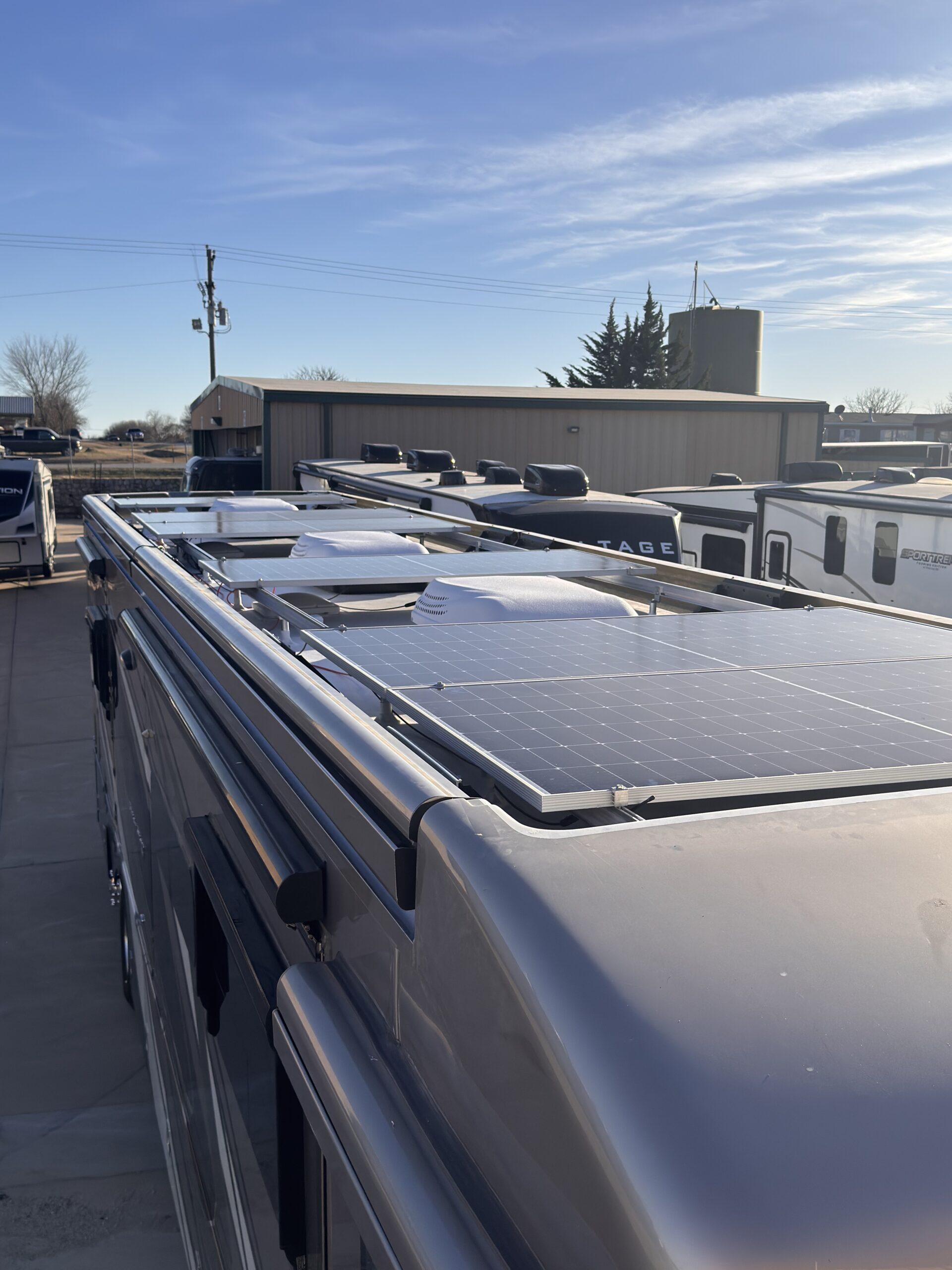 Aerial view of RV with solar panels installed on roof at Patriots RV Services